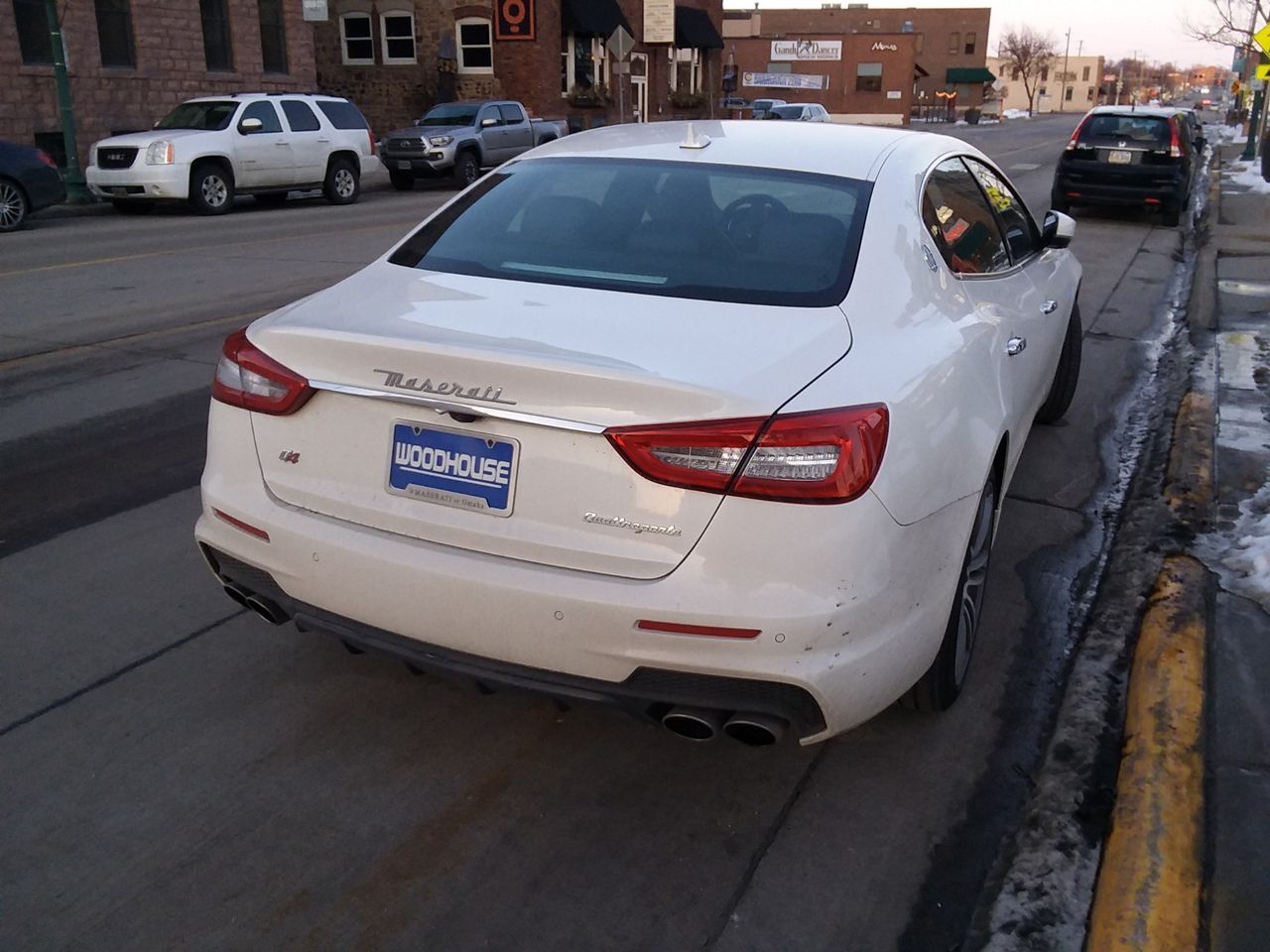 Maserati at the Bus Stop