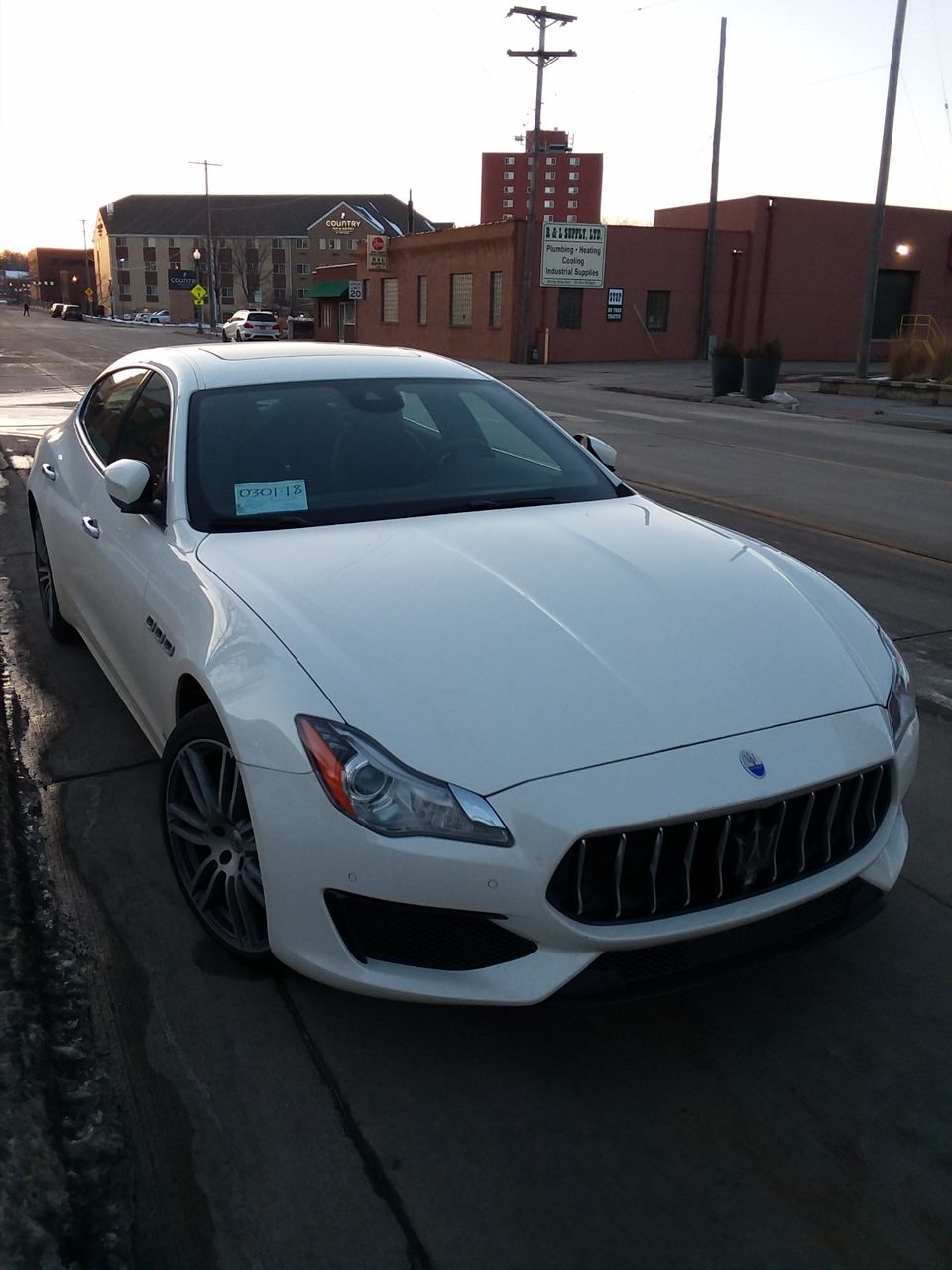 Maserati at the Bus Stop