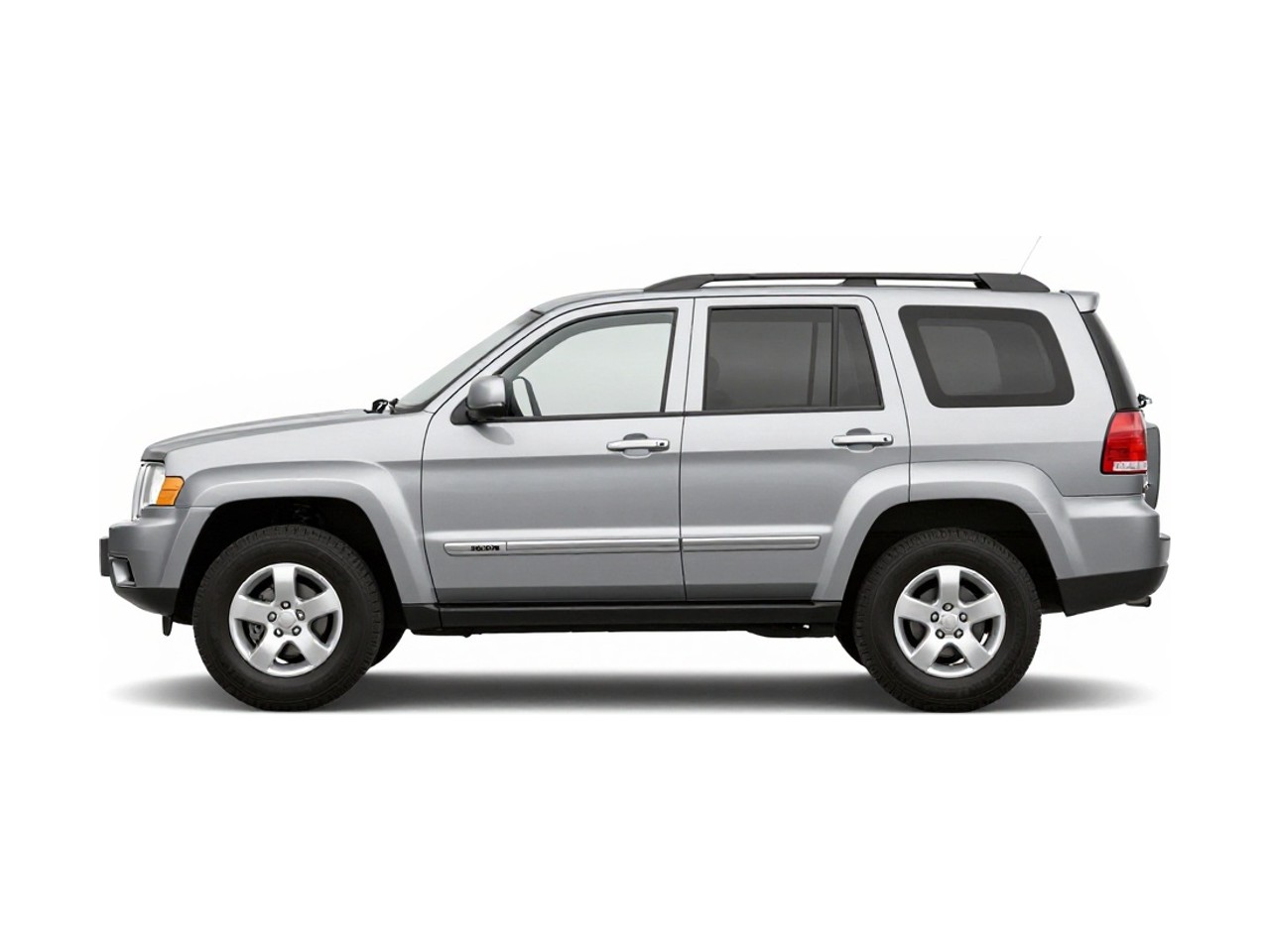 https://img.cruz.com/stock/2006/jeep/2006-jeep-commander-base-bright-silver-metallic-clearcoat