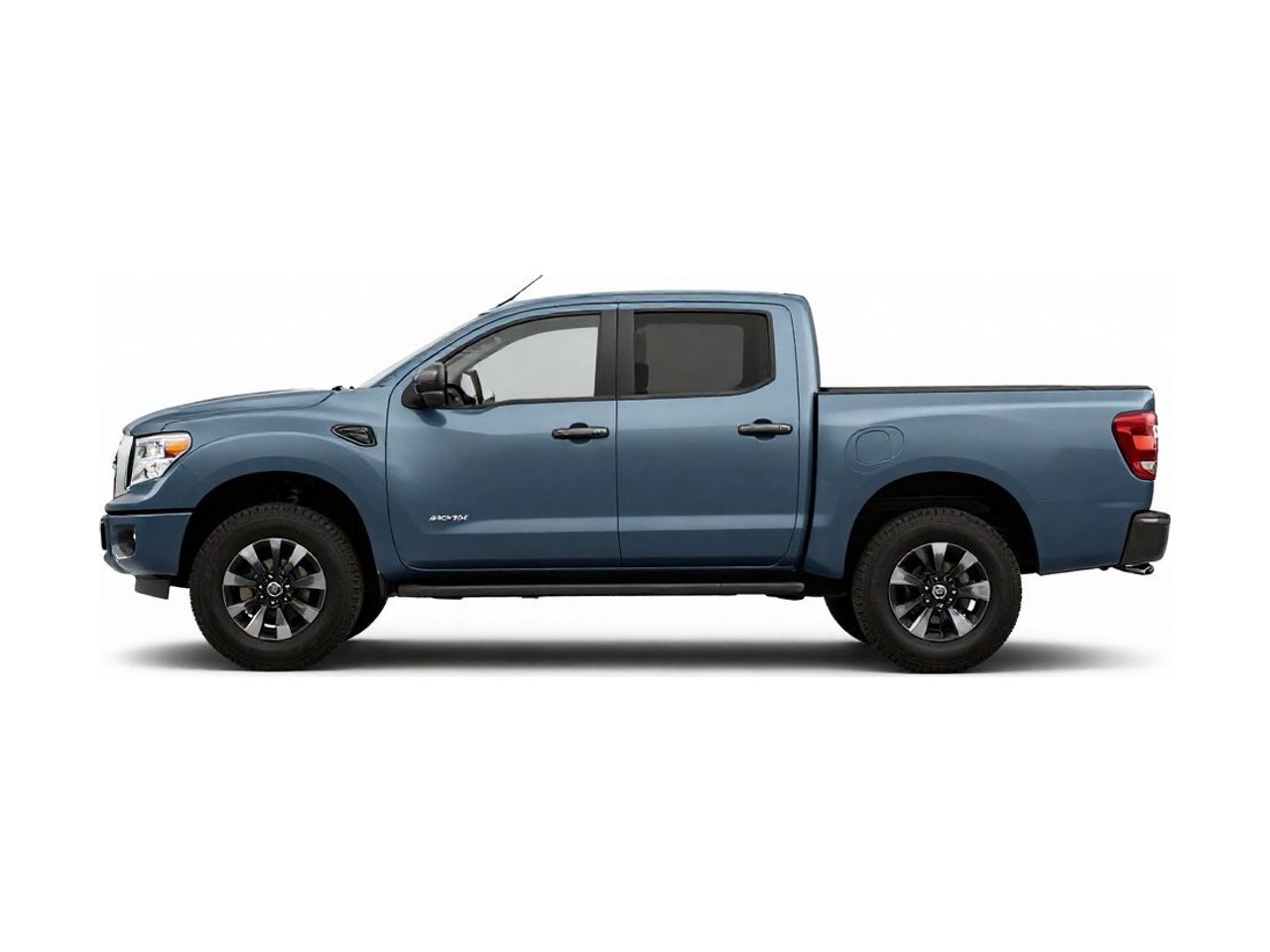https://img.cruz.com/stock/2014/nissan/2014-nissan-titan-pro-4x-graphite-blue