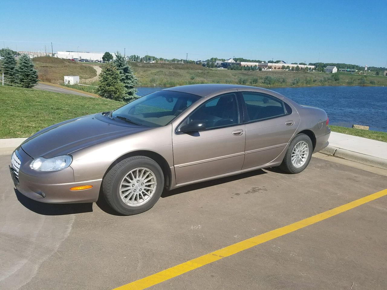 2012 Chrysler Concorde | Sioux Falls, SD, Gold, Front Wheel