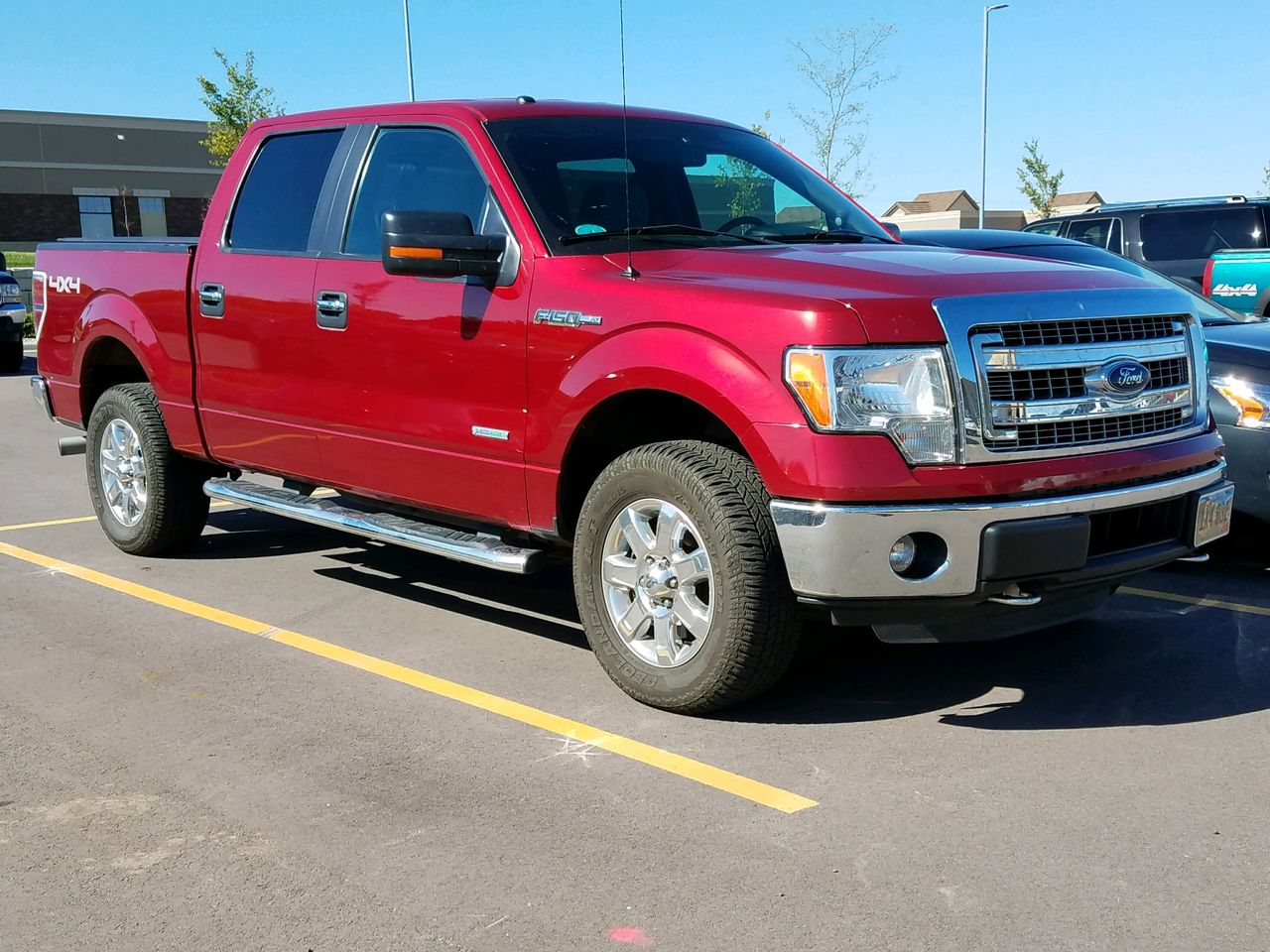 2014 Ford F-150 XLT | Sioux Falls, SD, Ruby Red Metallic Tinted Clear Coat (Red & Orange), 4x4