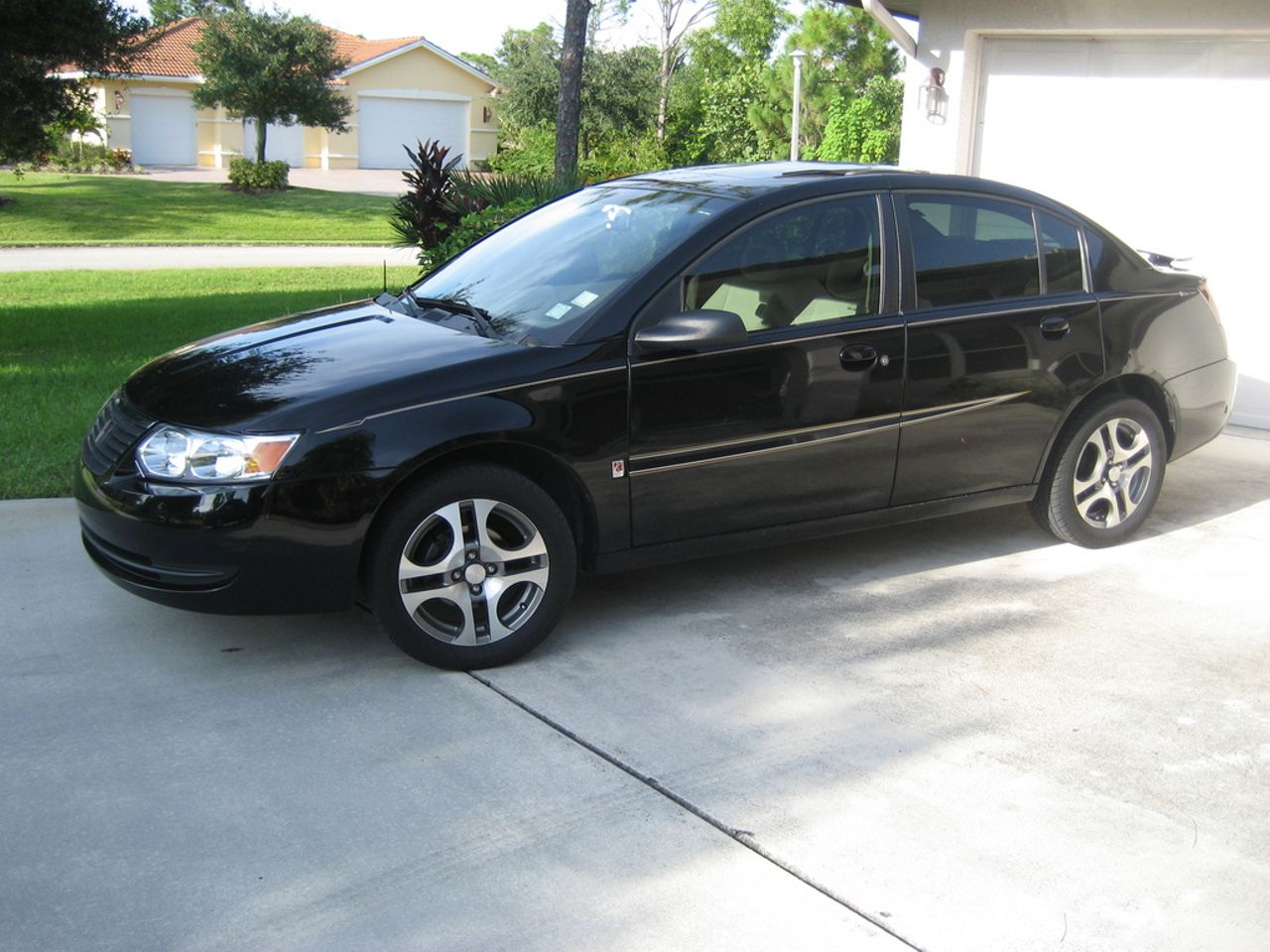 2005 Saturn Ion 1 | Brandon, SD, Black Onyx (Black), Front Wheel