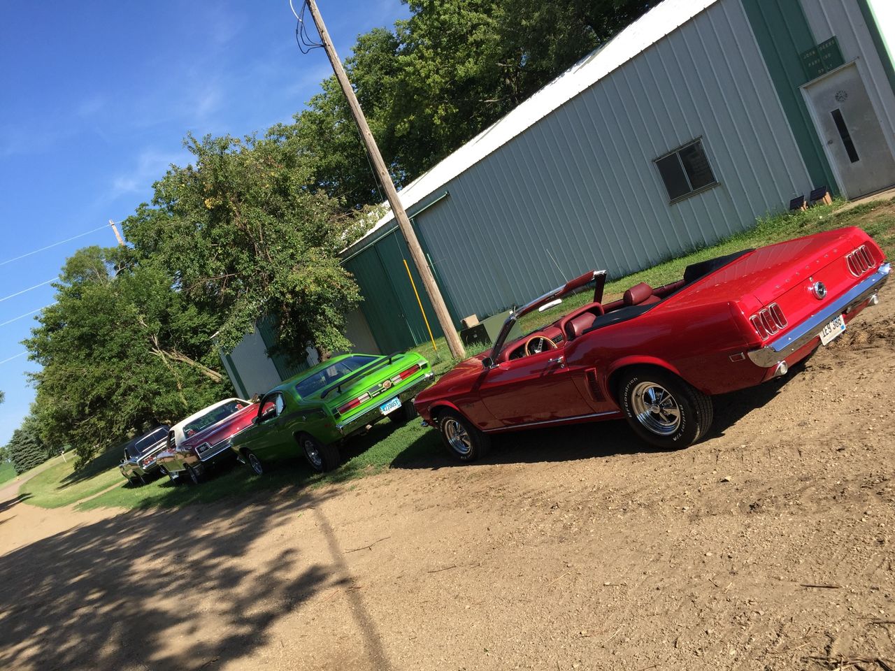 1969 Ford Mustang | Hartford, SD, Red & Orange, Rear Wheel