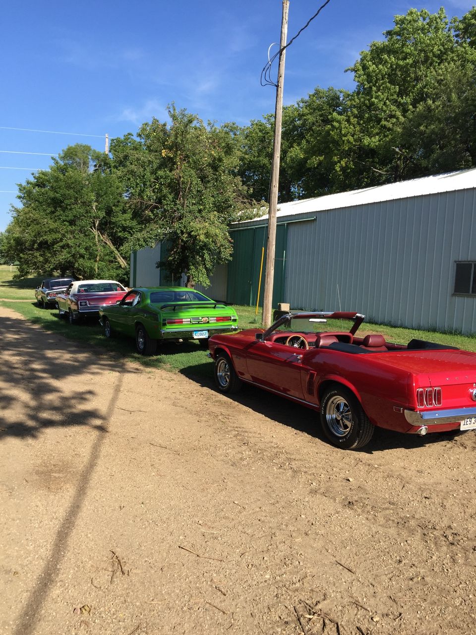 1969 Ford Mustang | Hartford, SD, Red & Orange, Rear Wheel