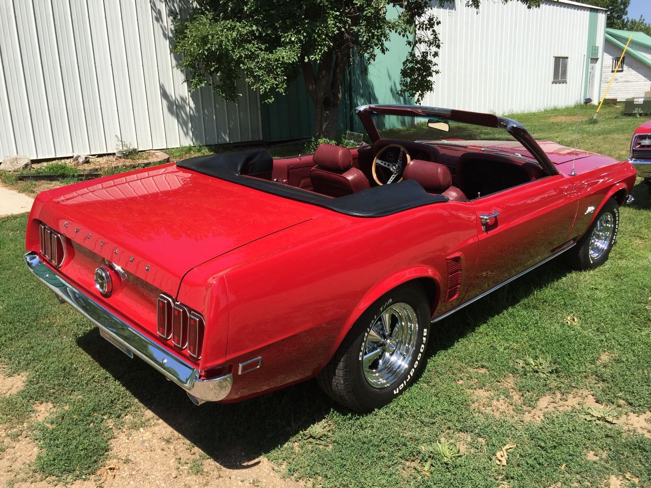 1969 Ford Mustang | Hartford, SD, Red & Orange, Rear Wheel