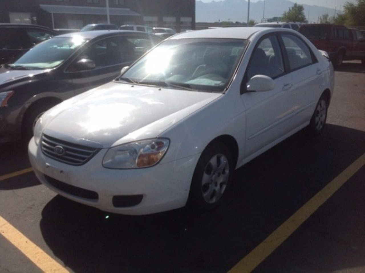 2005 Kia Spectra EX | Worthing, SD, Clear White (White), Front Wheel