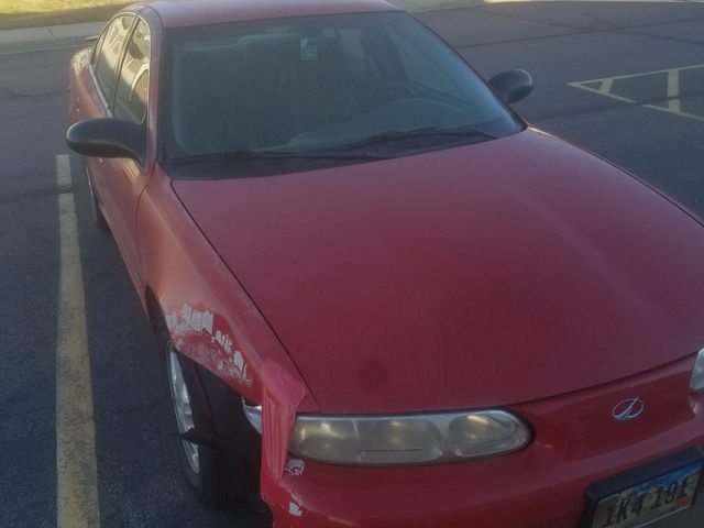 2004 Oldsmobile Alero GL1, Sport Red (Red & Orange), Front Wheel