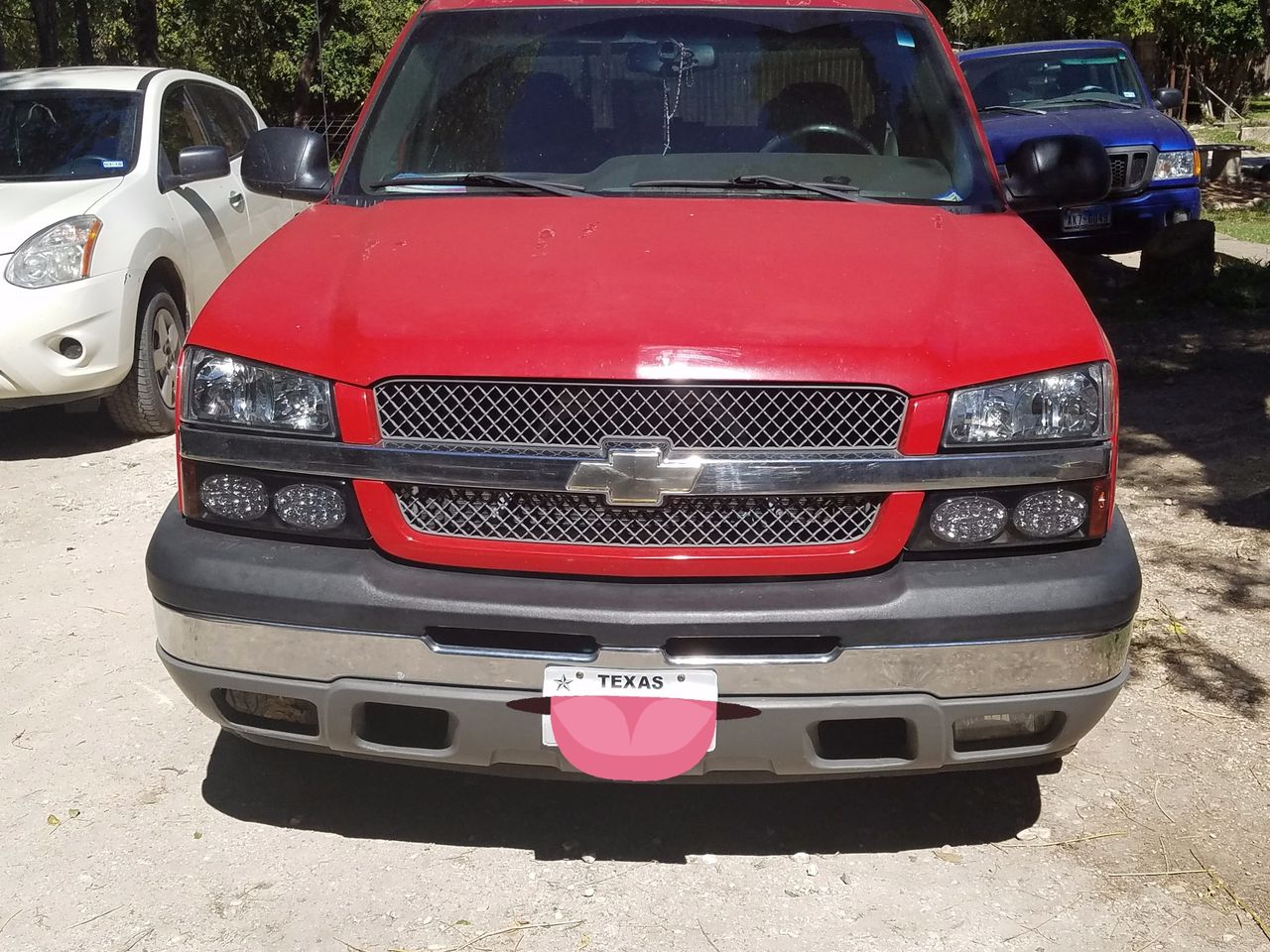 2004 Chevrolet Silverado 1500 Base | Ingram, TX, Victory Red (Red & Orange), Rear Wheel