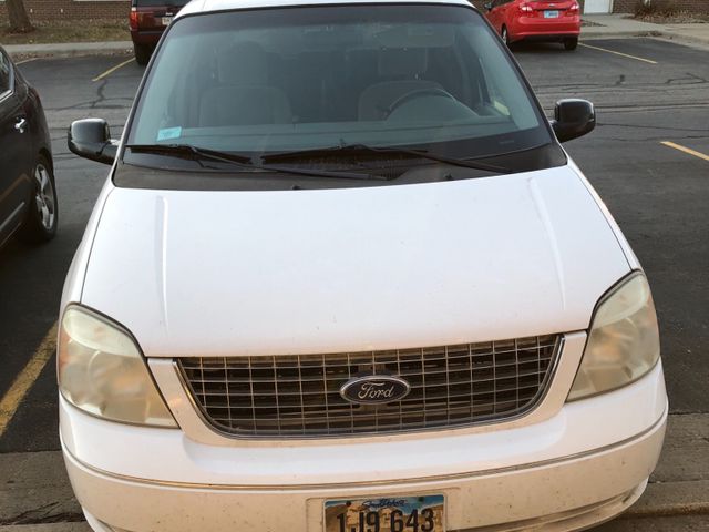 2005 Ford Freestar SES, Vibrant White Clearcoat (White), Front Wheel