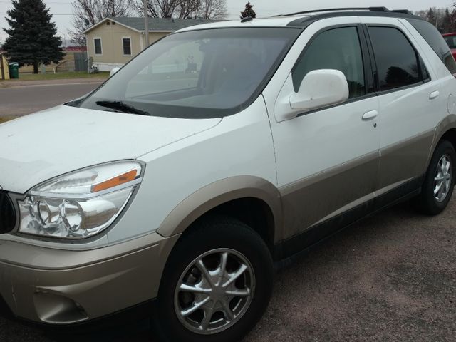 2004 Buick Encore Taupe, White