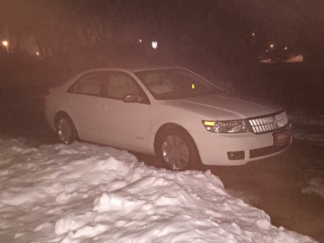 2008 Lincoln MKZ Base | Sioux Falls, SD, Dune Pearl Clearcoat Metallic (Brown & Beige), Front Wheel