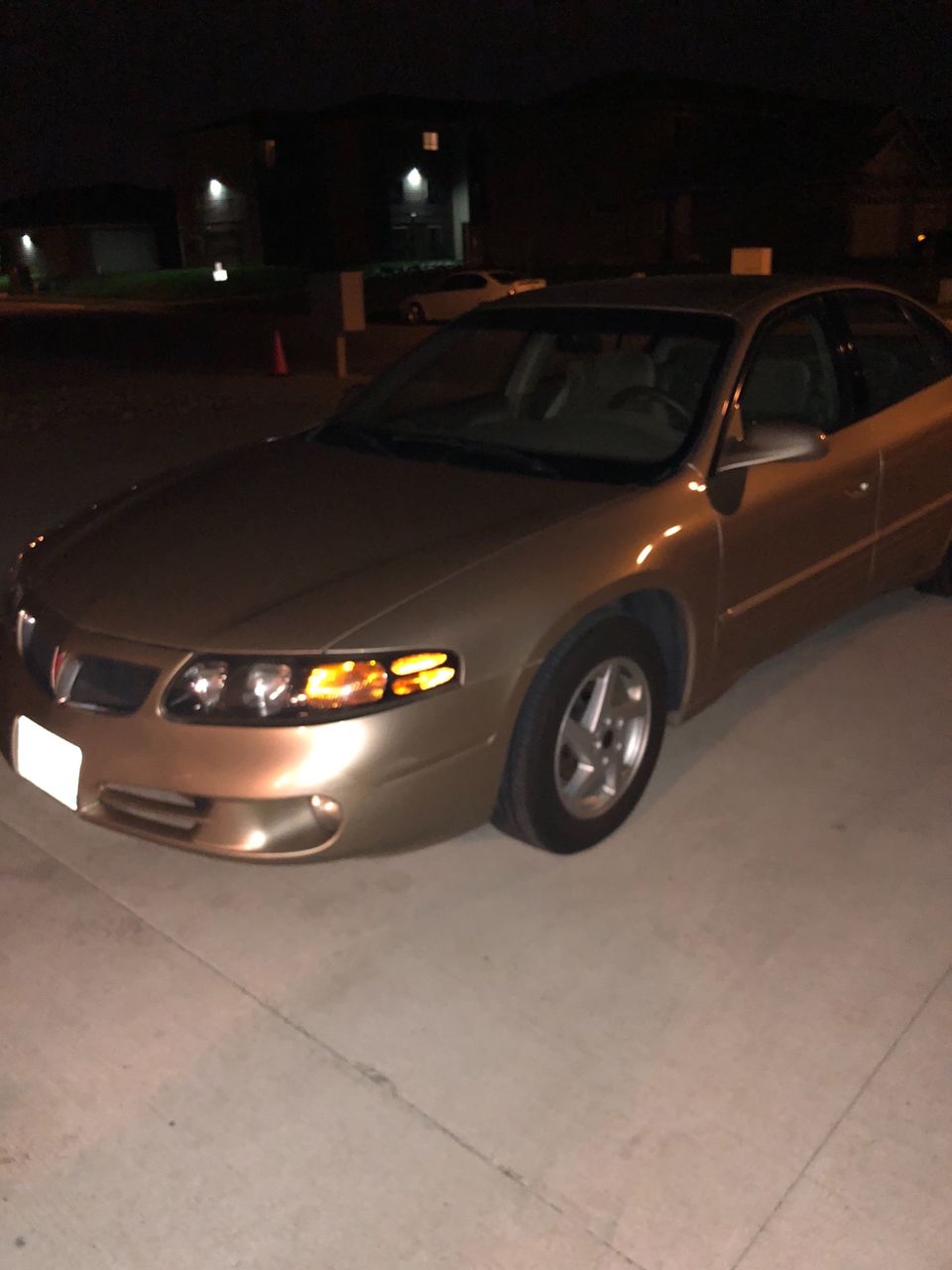 2005 Pontiac Bonneville SE | Sioux Falls, SD, Sedona Beige Metallic (Brown & Beige), Front Wheel