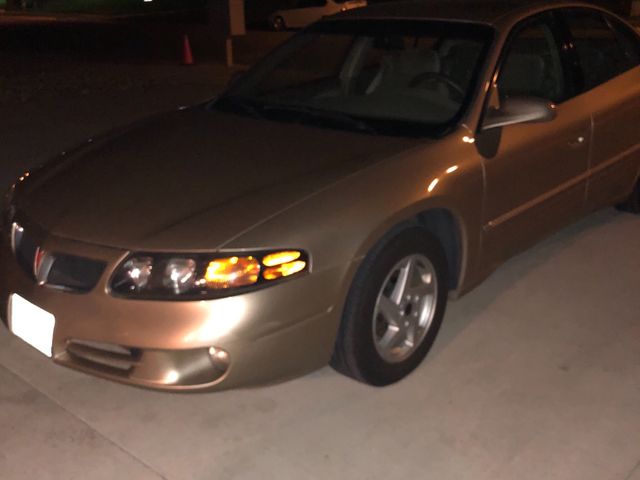 2005 Pontiac Bonneville SE, Sedona Beige Metallic (Brown & Beige), Front Wheel