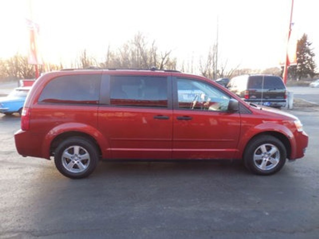 2008 Dodge Grand Caravan | Crooks, SD, Sunburst Orange Pearl Coat (Red & Orange), Front Wheel