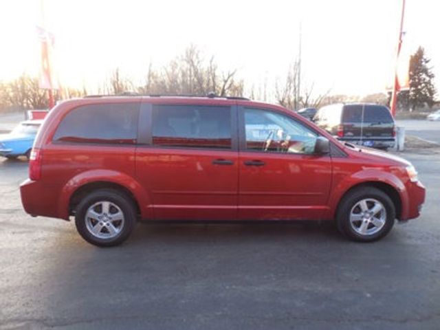 2008 Dodge Grand Caravan, Sunburst Orange Pearl Coat (Red & Orange), Front Wheel