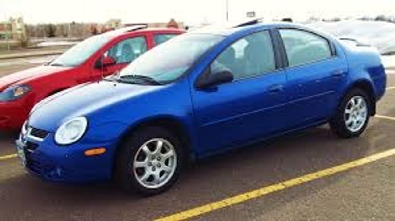 2005 Dodge Neon | Sioux Falls, SD, Midnight Blue Pearlcoat (Blue), Front Wheel