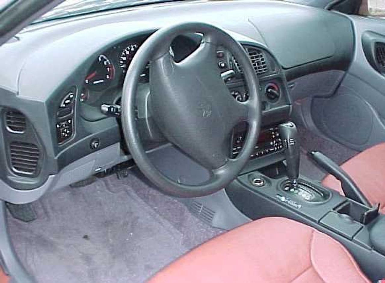 1999 Dodge Avenger | Mason City, IA, Bright White Clearcoat (White), Front Wheel