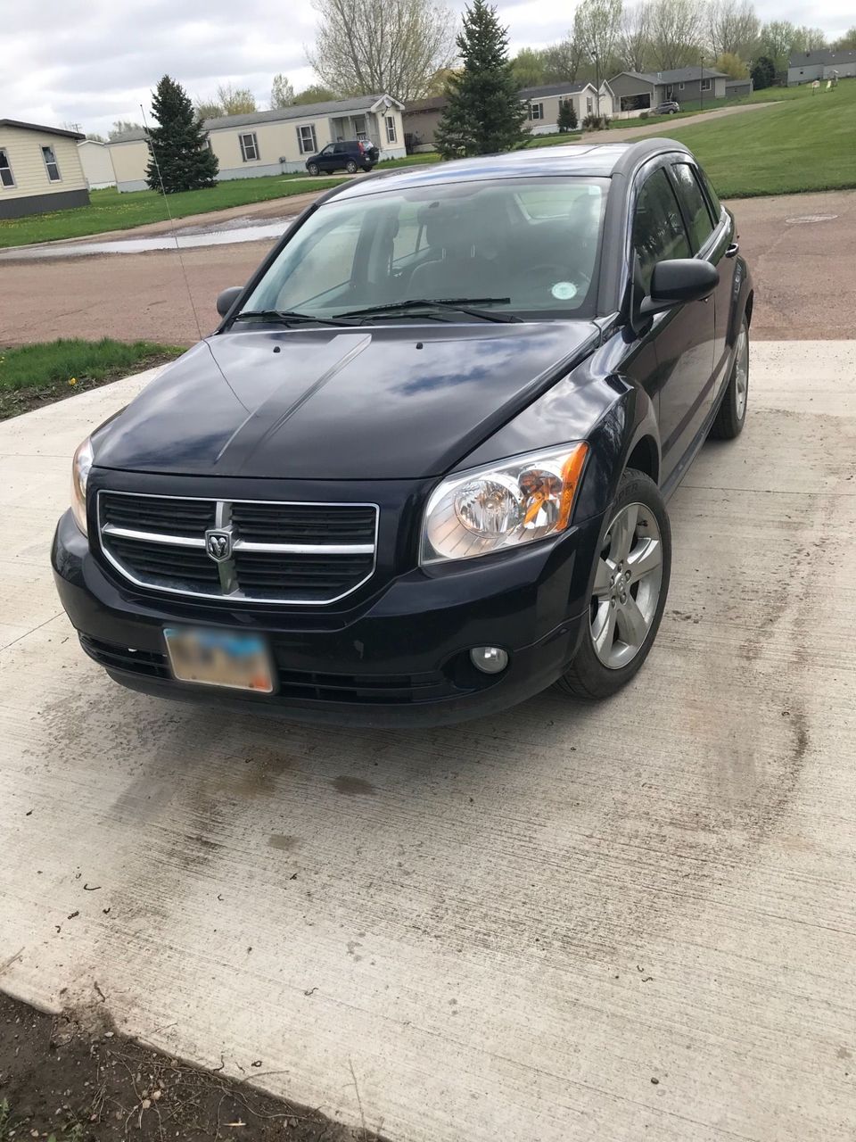 2011 Dodge Caliber Uptown | Lennox, SD, Blackberry Pearl Coat (Blue), Front Wheel