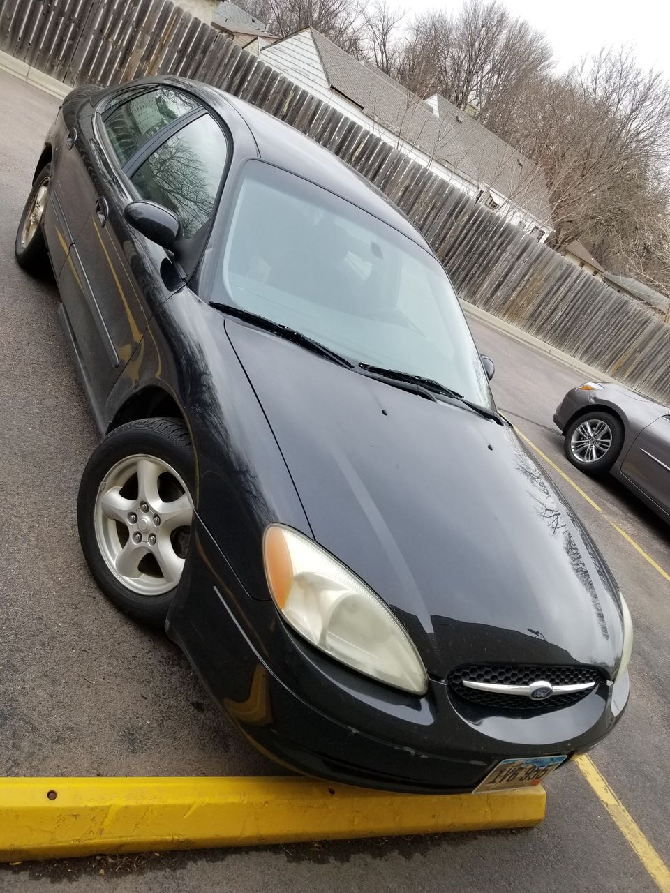 2002 Ford Taurus SE | Sioux Falls, SD, Black Clearcoat (Black), Front Wheel