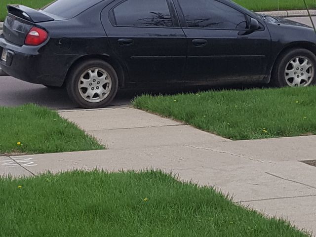 2003 Dodge Neon SXT, Black Clearcoat (Black), Front Wheel