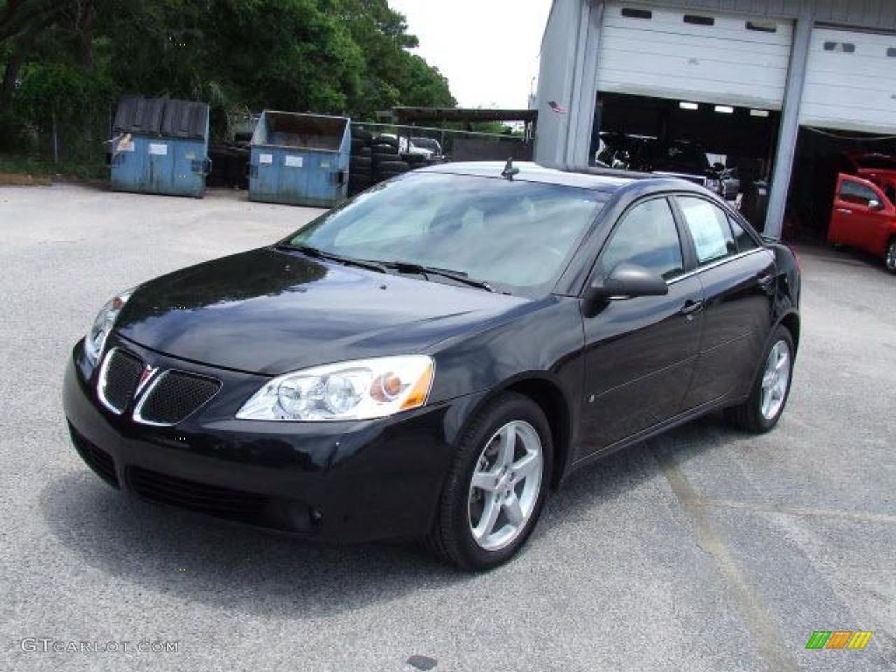 2009 Pontiac G6 Base | Sioux Falls, SD, Carbon Black Metallic (Black), Front Wheel