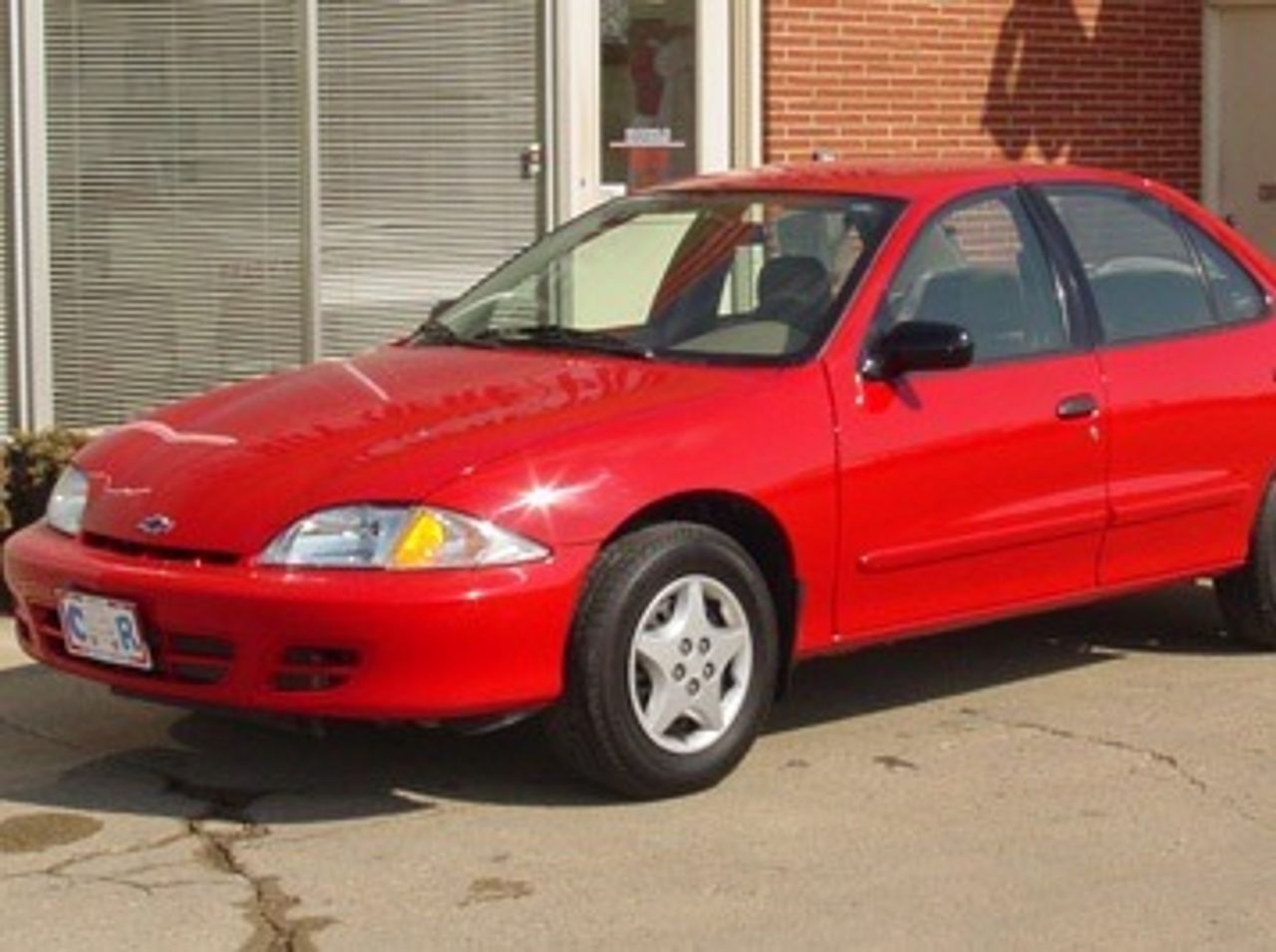 2002 Chevrolet Cavalier | Sioux Falls, SD, Bright Red (Red & Orange), Front Wheel