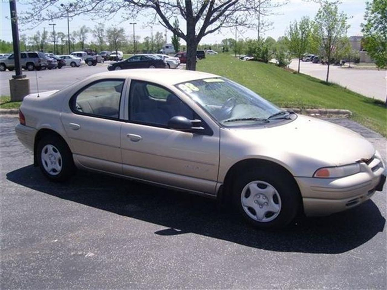 2000 Dodge Stratus SE | Sioux Falls, SD, Champagne Pearl Clearcoat (Gold & Cream), Front Wheel