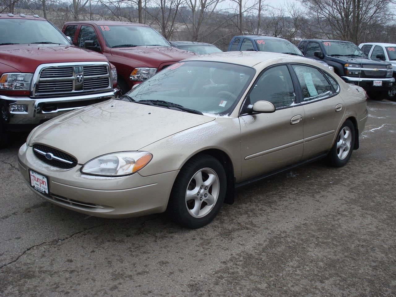 2000 Ford Taurus | Sioux Falls, SD, Harvest Gold Clearcoat Metallic (Gold & Cream), Front Wheel