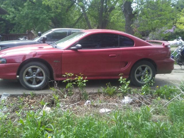 1999 Ford Mustang, Rio Red Tinted Clearcoat (Red & Orange), Rear Wheel