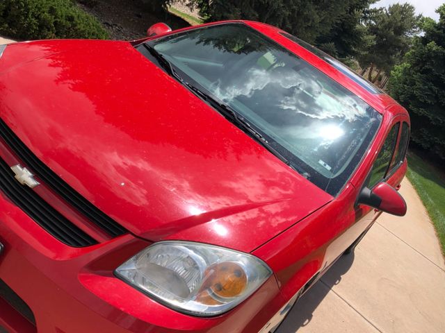 2006 Chevrolet Cobalt, Victory Red (Red & Orange), Front Wheel