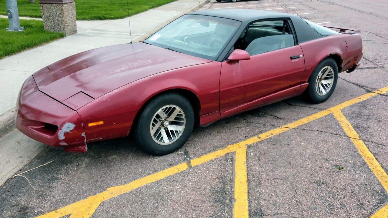 1991 Pontiac Firebird Base | Sioux Falls, SD, Bright Red (Red & Orange), Rear Wheel