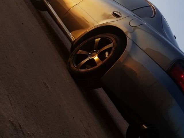 2004 Pontiac Bonneville GXP, Graystone Metallic (Gray), Front Wheel