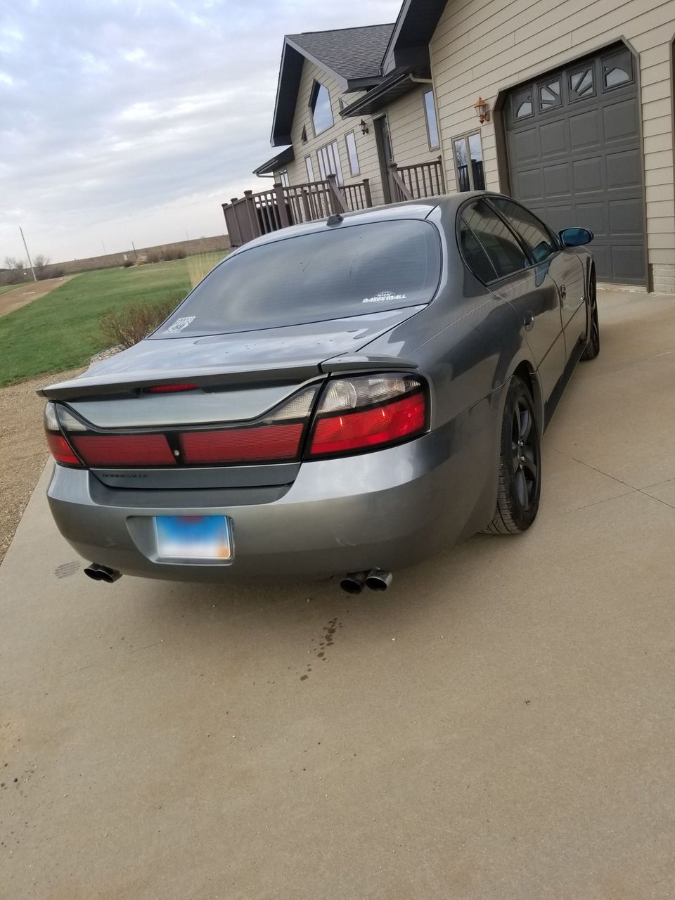 2004 Pontiac Bonneville GXP | Freeman, SD, Graystone Metallic (Gray), Front Wheel