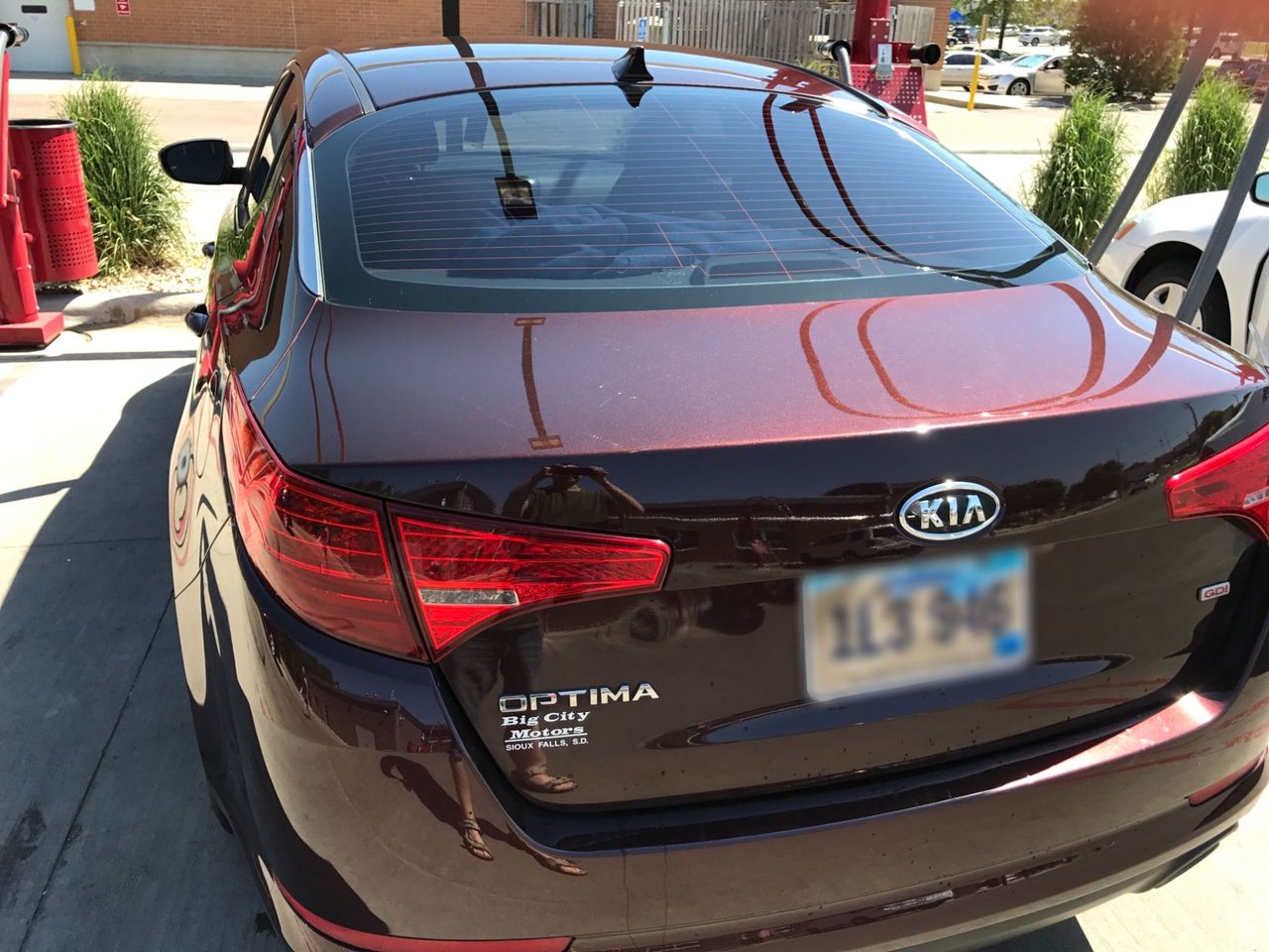 2011 Kia Optima LX | Sioux Falls, SD, Dark Cherry (Red & Orange), Front Wheel