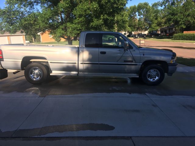 1999 Dodge Ram Pickup 2500 ST, Radiant Red (Red & Orange), Rear Wheel