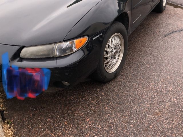 1999 Pontiac Grand Prix, Black (Black), Front Wheel