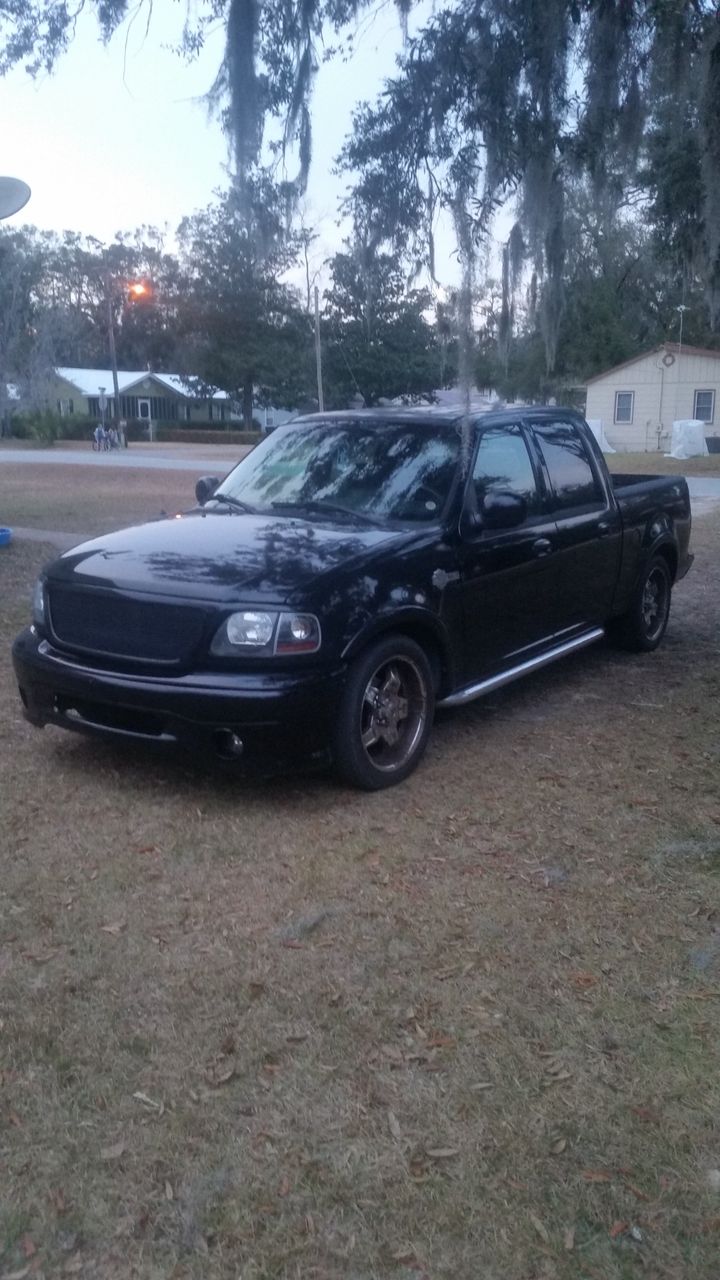 2002 Ford F-150 Harley-Davidson | Miami, FL, Black Clearcoat (Black), Rear Wheel