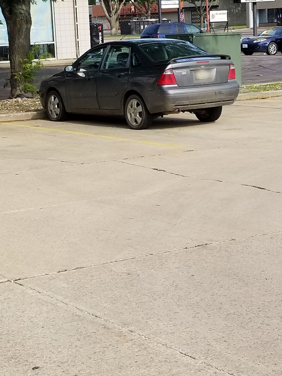 2007 Ford Focus | Tea, SD, Liquid Grey Clearcoat Metallic (Gray), Front Wheel