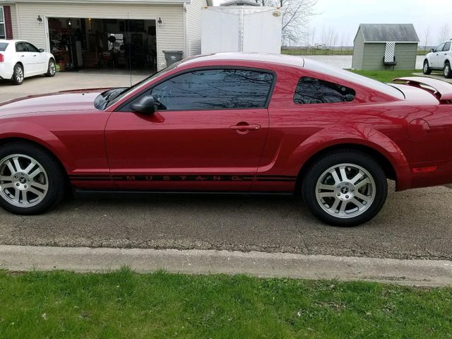 2005 Ford Mustang V6 Deluxe, Redfire Clearcoat Metallic (Red & Orange), Rear Wheel
