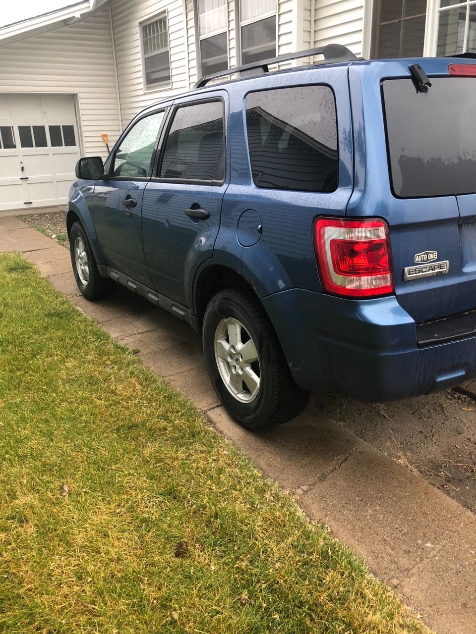 2010 Ford Escape XLT | Bridgeport, NE, Steel Blue Metallic (Blue), Front Wheel