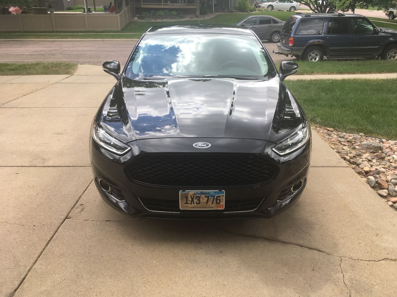 2016 Ford Fusion Titanium | Sioux Falls, SD, Shadow Black (Black), Front Wheel