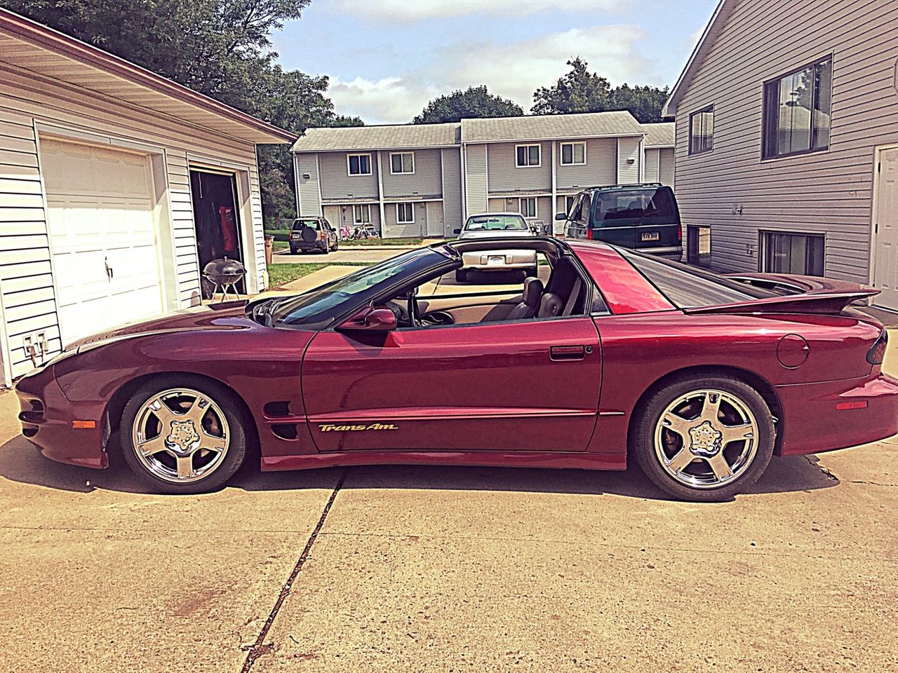 2000 Pontiac Firebird Trans Am | Sioux Falls, SD, Maple Red Metallic (Red & Orange), Rear Wheel