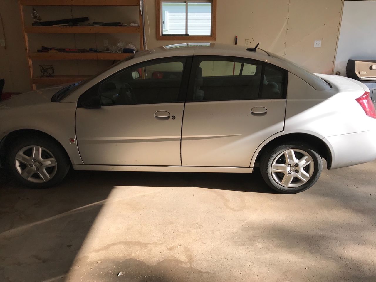 2006 Saturn Ion | Sioux Falls, SD, Storm Grey (Gray), Front Wheel