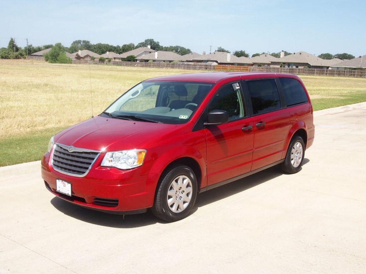 2008 Chrysler Town and Country | Worthing, SD, Deep Crimson Crystal Pearl (Red & Orange), Front Wheel