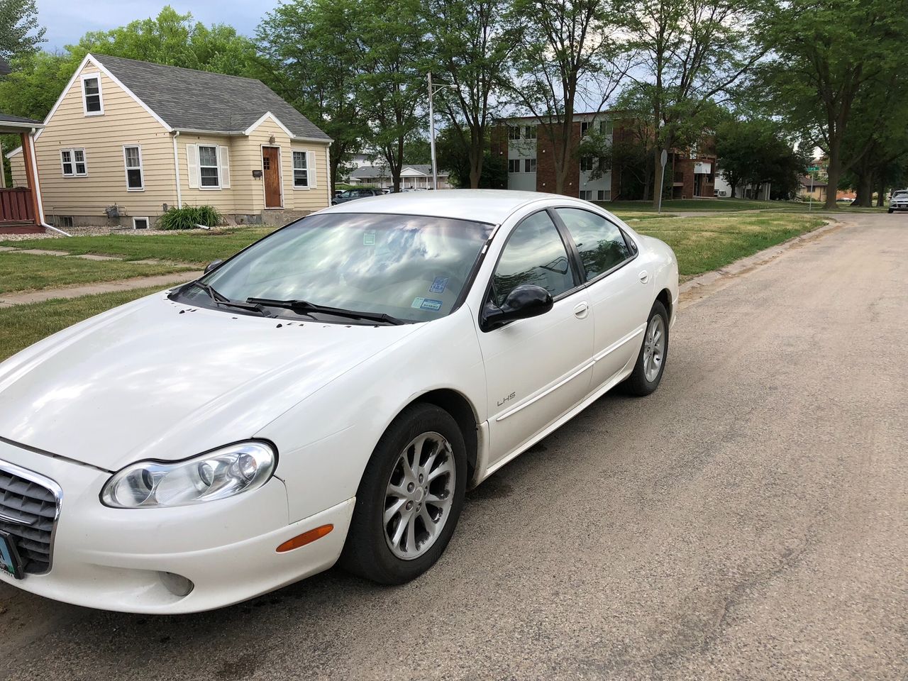 1999 Chrysler LHS Base | Brookings, SD, Stone White Clearcoat (White), Front Wheel