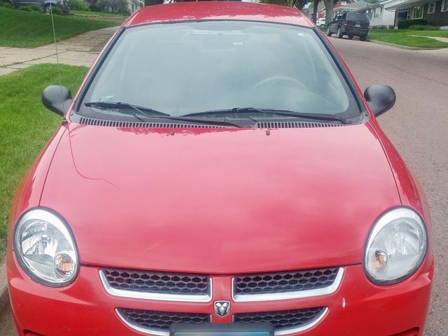 2005 Dodge Neon SE, Flame Red Clearcoat (Red & Orange), Front Wheel
