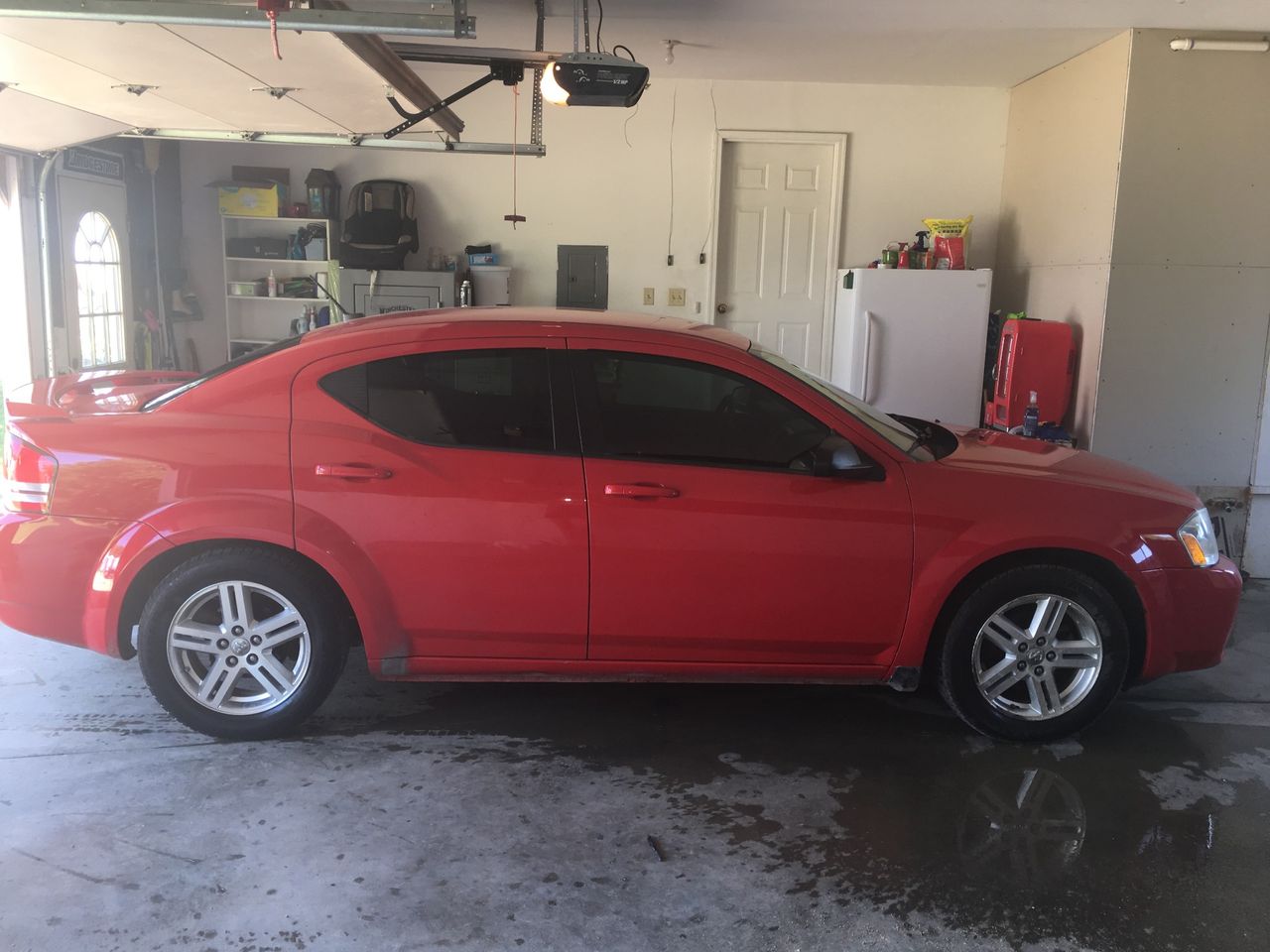 2009 Dodge Avenger | Reading, MN, Inferno Red Crystal Pearl Coat (Red & Orange), Front Wheel