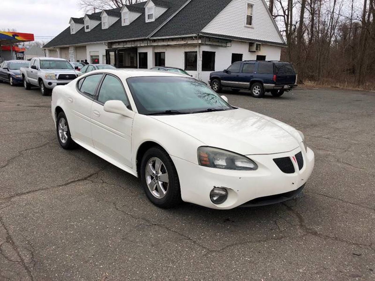 2005 Pontiac Grand Prix | Brandon, SD, Ivory White (White), Front Wheel