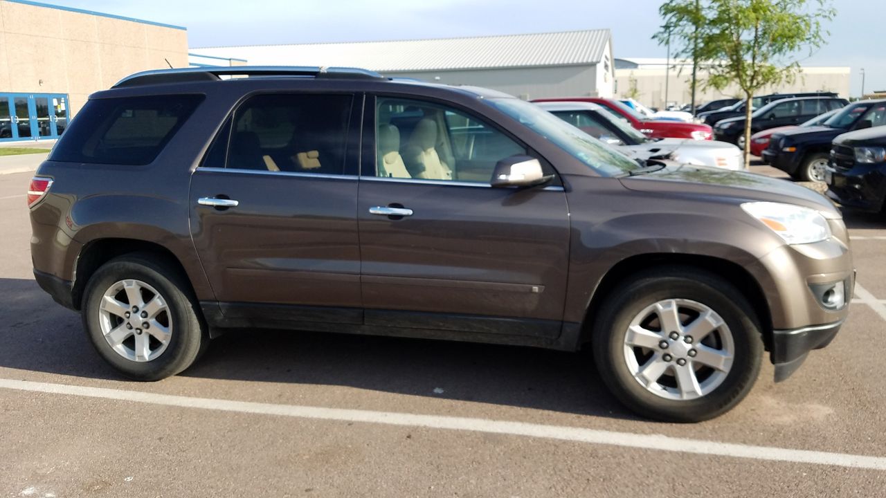 2008 Saturn Outlook XR | Sioux Falls, SD, Cocoa (Brown & Beige), Front Wheel